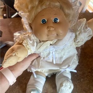Classic Baby Doll with Blue Eyes and Cream Outfit